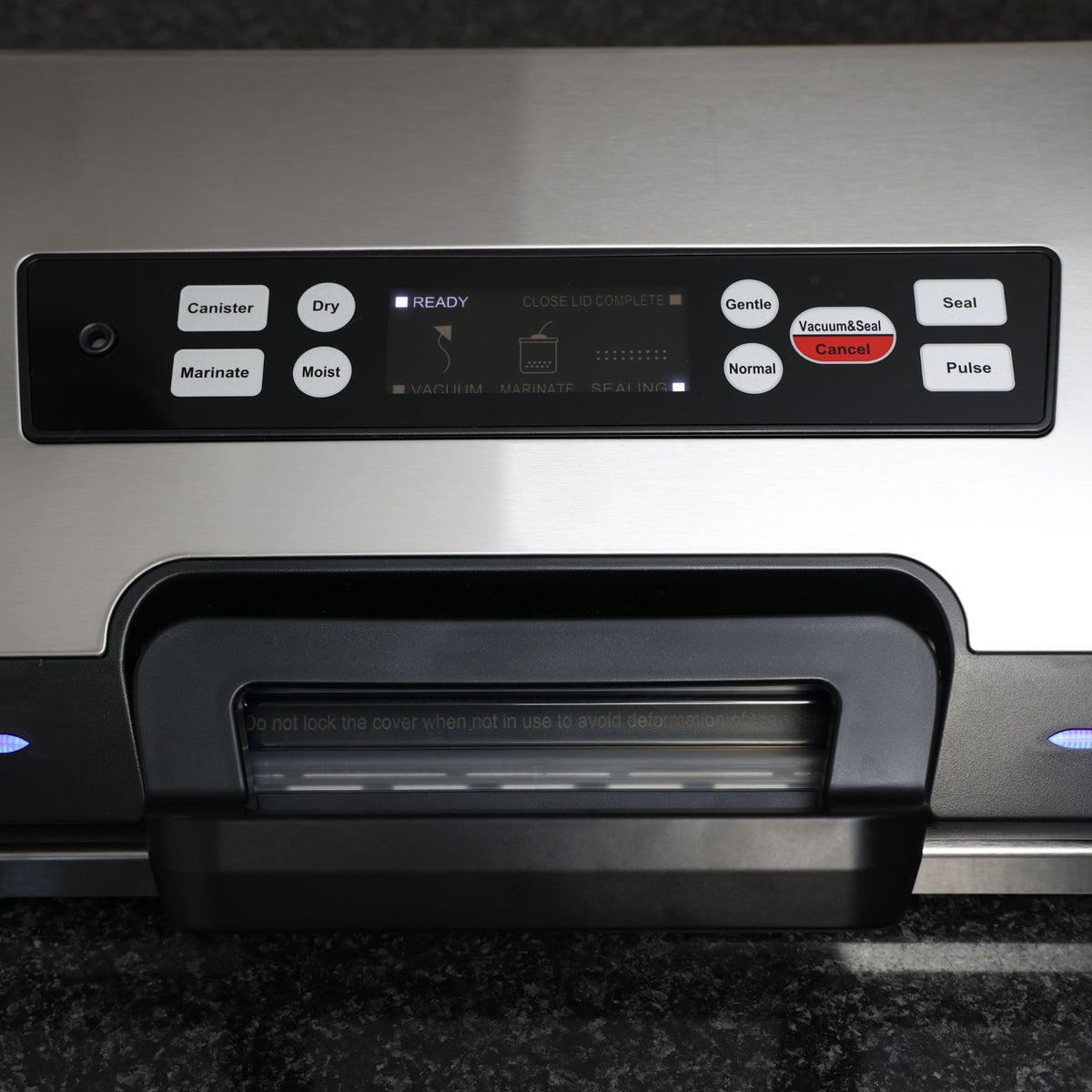 Liquid Ready Vacuum Sealer showing top down of control panel and handle. 